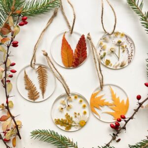 warm ornaments pressed flower fern and felt